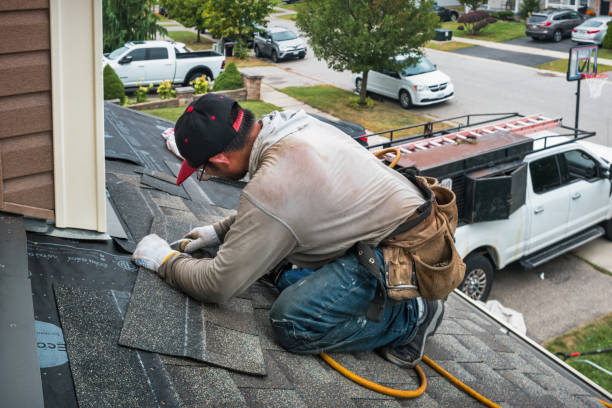 Professional Roofing technician working in Canastota, NY